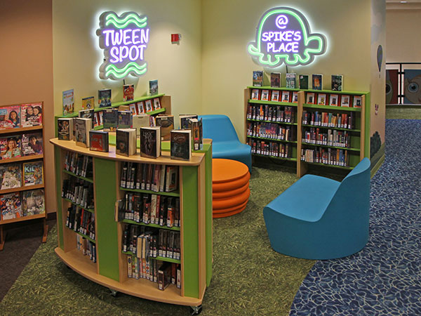 Shelving and signs in Tween Spot